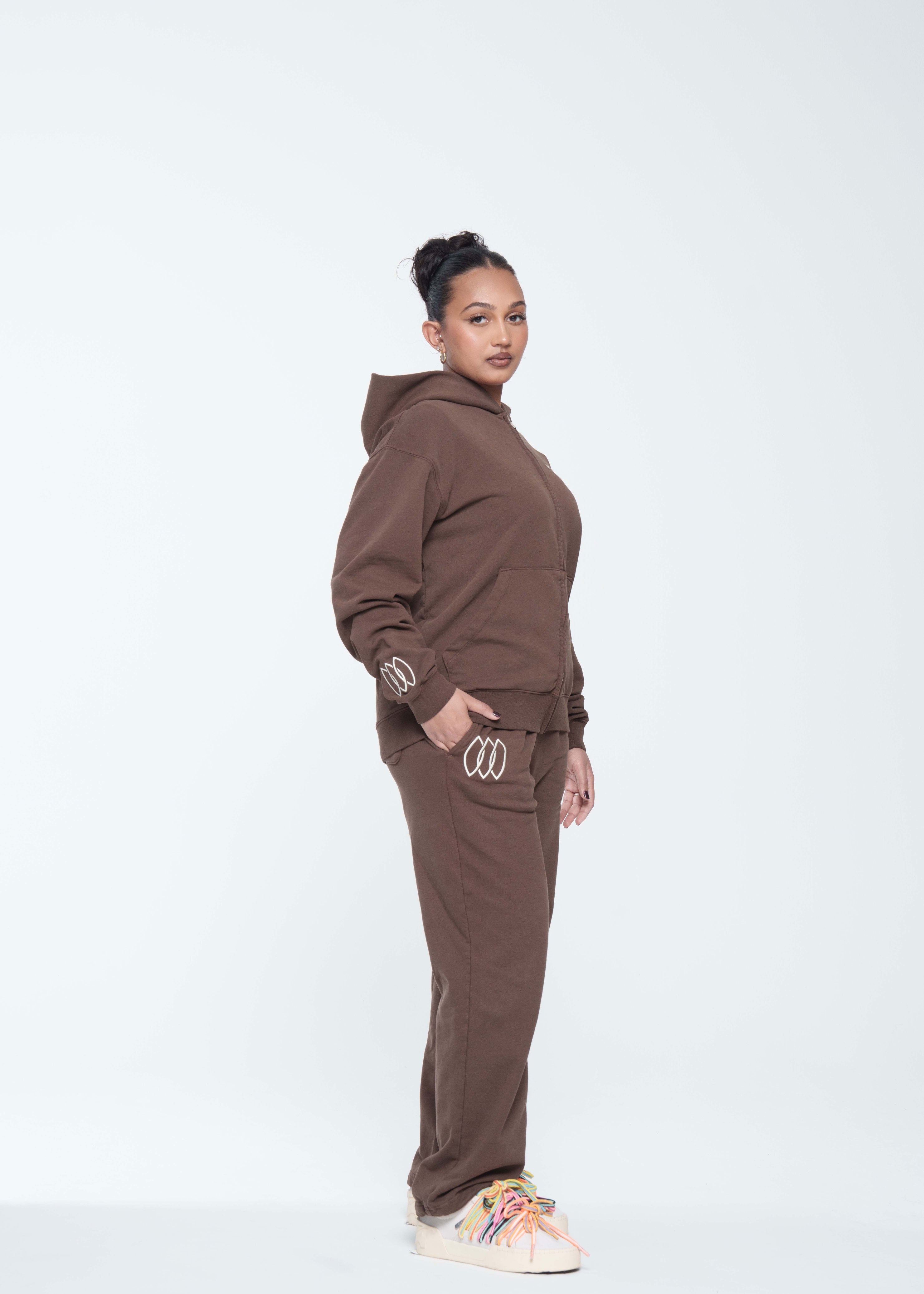 Model is wearing size Medium in Forever Connected Sweatsuit in Brown