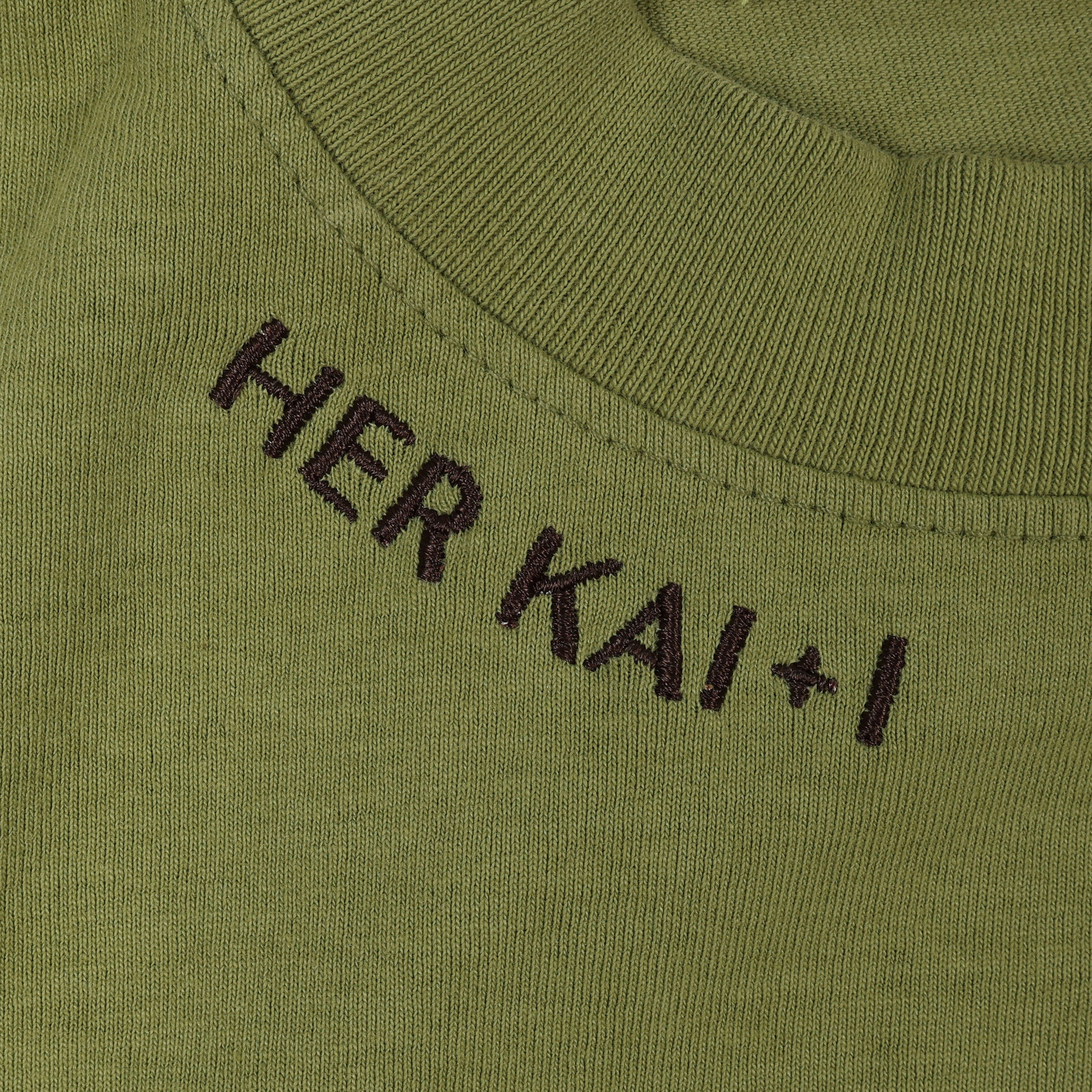 Detail View of Her Kai & I  Logo embroidery along neckline